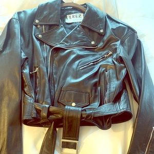 Leather jacket with silver zipper details